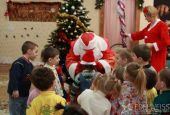 Socially vulnerable children visited by Santa Clause and Snow White